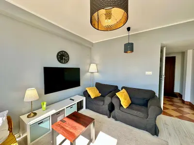 Telewizja i/lub zestaw kina domowego w obiekcie GOLD 2 King Size Bed, metro x2 free WiFi, 50'TV Netflix, HBO, AppleTV+