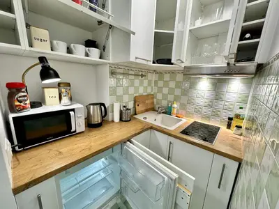Kuchnia lub aneks kuchenny w obiekcie GOLD 2 King Size Bed, metro x2 free WiFi, 50'TV Netflix, HBO, AppleTV+