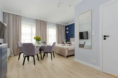 Łóżko lub łóżka w pokoju w obiekcie Studio Centrum Pawia 51 Apartments by Renters Prestige