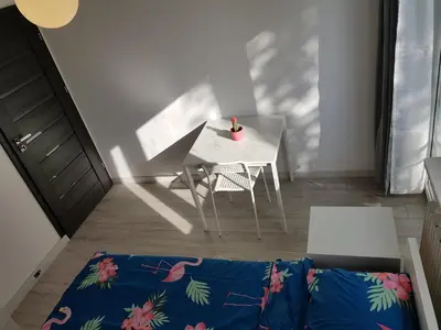 Łóżko lub łóżka w pokoju w obiekcie MirrorRoom PL Airport