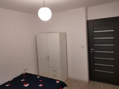 Łóżko lub łóżka w pokoju w obiekcie MirrorRoom PL Airport