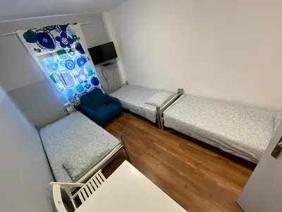 Łóżko lub łóżka w pokoju w obiekcie Pokoje Warszawa Modlinska 267 No 2