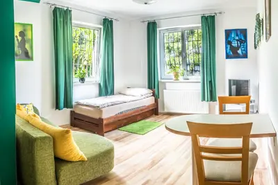 Łóżko lub łóżka w pokoju w obiekcie Apartament z parkingiem