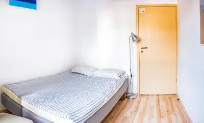 Łóżko lub łóżka w pokoju w obiekcie Apartament z parkingiem