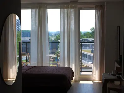 Łóżko lub łóżka w pokoju w obiekcie Apartament CITY BREAK 124
