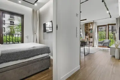 Łóżko lub łóżka w pokoju w obiekcie Luxury 2-room apartment in Praga-Północ Port Praski