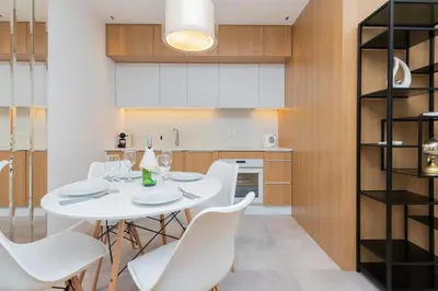 Kuchnia lub aneks kuchenny w obiekcie Mennica Residence - City Center Apartments by Noclegi Renters