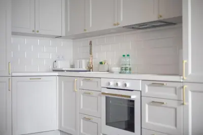 Kuchnia lub aneks kuchenny w obiekcie Burakowska Pastel Elegant Apartment by BookingHost