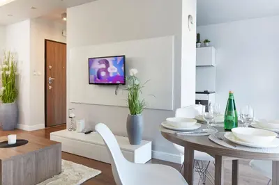 Telewizja i/lub zestaw kina domowego w obiekcie Wronia Business Residence by BookingHost