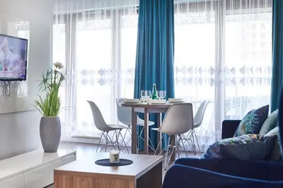 Część wypoczynkowa w obiekcie Wronia Business Residence by BookingHost