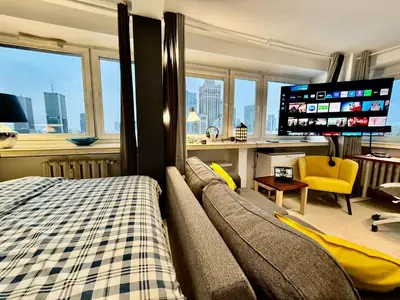 Telewizja i/lub zestaw kina domowego w obiekcie SAWA Apartment 2xMetro WiFi 500 Mbs 50’TV Netflix HBO AppleTV+