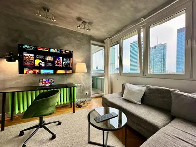 Telewizja i/lub zestaw kina domowego w obiekcie PALACE 2 WiFi 600 Mbs 55’TV Netflix HBO 2xMetro AppleTV