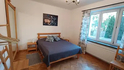 Łóżko lub łóżka w pokoju w obiekcie Willa Stary Dom