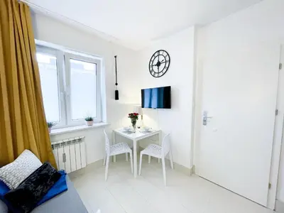 Telewizja i/lub zestaw kina domowego w obiekcie Studio na Powiślu SuperApart Tamka 7