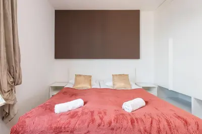 Łóżko lub łóżka w pokoju w obiekcie Atelier Residence Apartment by Noclegi Renters