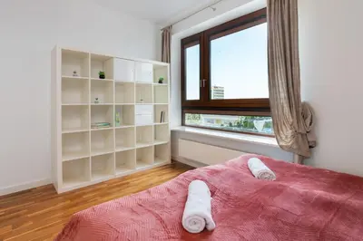 Łóżko lub łóżka w pokoju w obiekcie Atelier Residence Apartment by Noclegi Renters