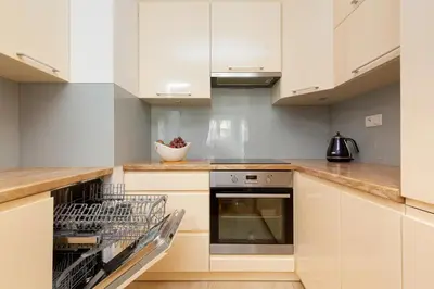 Kuchnia lub aneks kuchenny w obiekcie Atrium Ursus Warsaw Apartments by Noclegi Renters