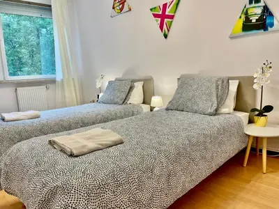 Łóżko lub łóżka w pokoju w obiekcie Warsaw Concierge Wola Ratusz