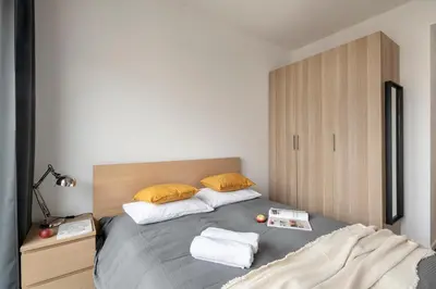 Łóżko lub łóżka w pokoju w obiekcie ShortStayPoland Kolejowa (B52)