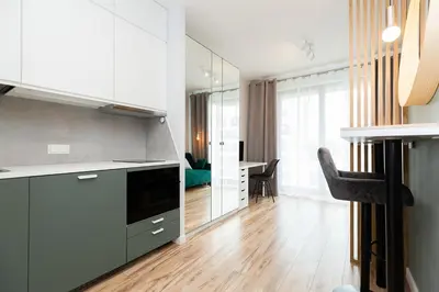 Kuchnia lub aneks kuchenny w obiekcie Cozy apartment Jana Kazimierza, Wola