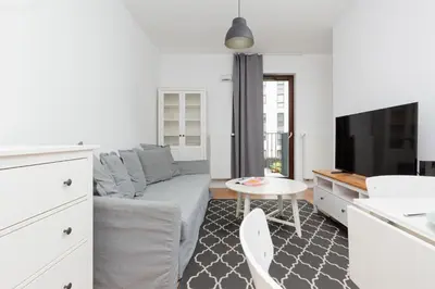 Telewizja i/lub zestaw kina domowego w obiekcie Apartments Westfield Arkadia Burakowska by Noclegi Renters