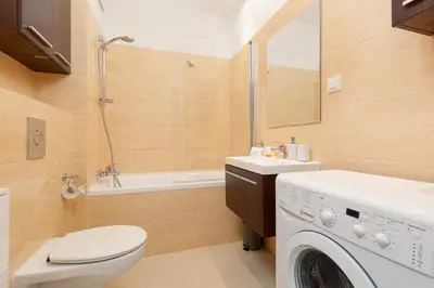 Łazienka w obiekcie 19 Dzielnica Apartamenty Warszawa by Noclegi Renters