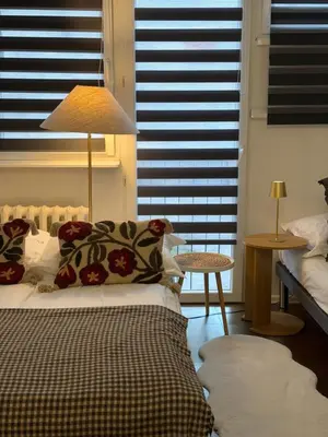 Łóżko lub łóżka w pokoju w obiekcie Apartament Warszawa Śródmieście