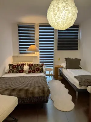 Łóżko lub łóżka w pokoju w obiekcie Apartament Warszawa Śródmieście