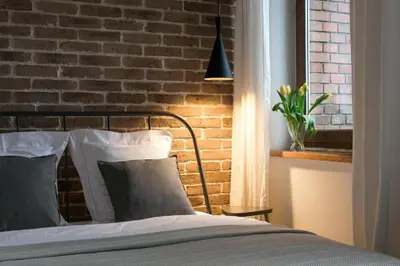 Łóżko lub łóżka w pokoju w obiekcie Green Żoliborz Apartment