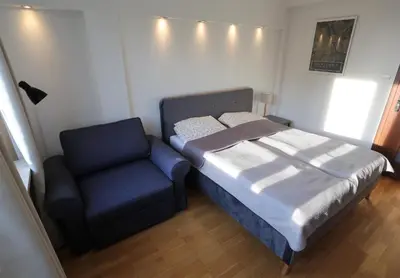 Łóżko lub łóżka w pokoju w obiekcie Apartament MGM Karmelicka