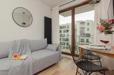 Część wypoczynkowa w obiekcie Forum Wola Jana Kazimierza Apartment by Noclegi Renters