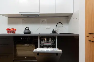 Kuchnia lub aneks kuchenny w obiekcie Atrium Promenada Apartments Gocław by Noclegi Renters