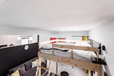 Łóżko lub łóżka w pokoju w obiekcie Chill Apartments K15 Two Floor House