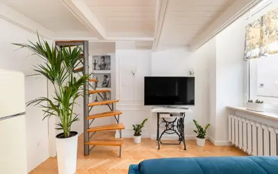 Telewizja i/lub zestaw kina domowego w obiekcie Apartament Królewska by Your Freedom