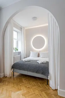 Łóżko lub łóżka w pokoju w obiekcie Poznańska Point