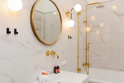 Łazienka w obiekcie LUX Golden Apartment Praga Kępna by Renters Prestige