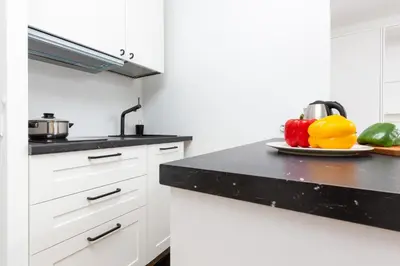 Kuchnia lub aneks kuchenny w obiekcie Studio Apartment Ochota Siemieńskiego by Noclegi Renters