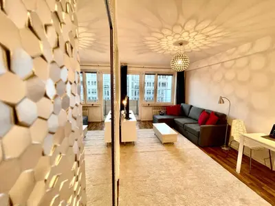 Część wypoczynkowa w obiekcie DECOR 2 metro fast WiFI 55’TV Netflix HBO cozy