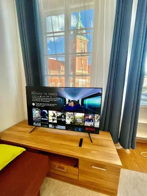 Telewizja i/lub zestaw kina domowego w obiekcie ROYAL 2 Old Town fast WiFi Netflix HBO AppleTV+