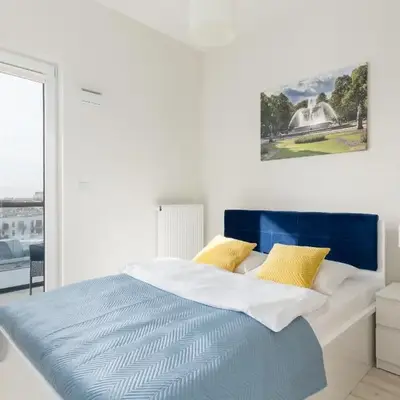 Wola Chic Blue Apartment by BookingHost