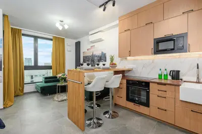 Kuchnia lub aneks kuchenny w obiekcie Lumina Premium Apartments with view on center Warsaw