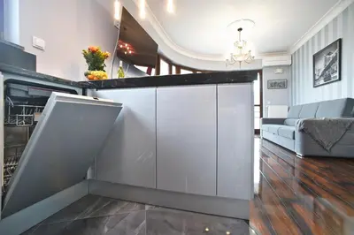Kuchnia lub aneks kuchenny w obiekcie Siedmiogrodzka 7 Serviced Apartments by P&O