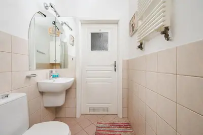 Łazienka w obiekcie Metro Młynów Pleasant Apartament by BookingHost