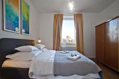 Łóżko lub łóżka w pokoju w obiekcie Zoliborz P&O Serviced Apartments