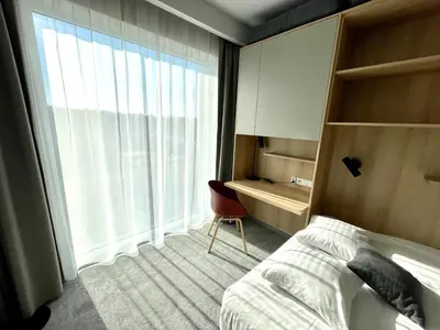 Łóżko lub łóżka w pokoju w obiekcie Wilanów Residence Apartments