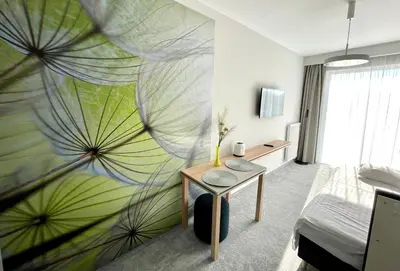 Telewizja i/lub zestaw kina domowego w obiekcie Wilanów Residence Apartments