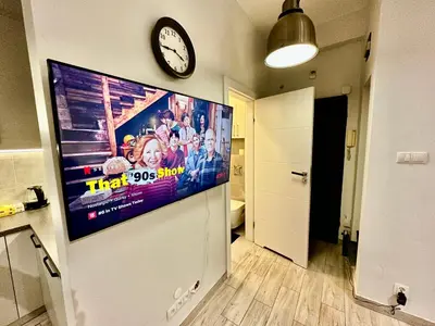 Telewizja i/lub zestaw kina domowego w obiekcie Super FORUM 2 Metro Fast WiFi Netflix, HBO, AppleTV
