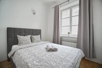 Łóżko lub łóżka w pokoju w obiekcie Warsaw Premium Apartments Standard Old Town