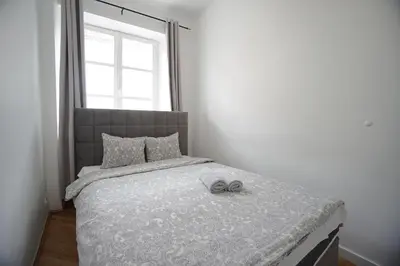 Łóżko lub łóżka w pokoju w obiekcie Warsaw Premium Apartments Standard Old Town