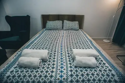 Łóżko lub łóżka w pokoju w obiekcie YOURAPART STARÓWKA z JACUZZI